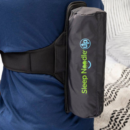 Person wearing a black Sleep Noodle product on their back with a visible brand logo.